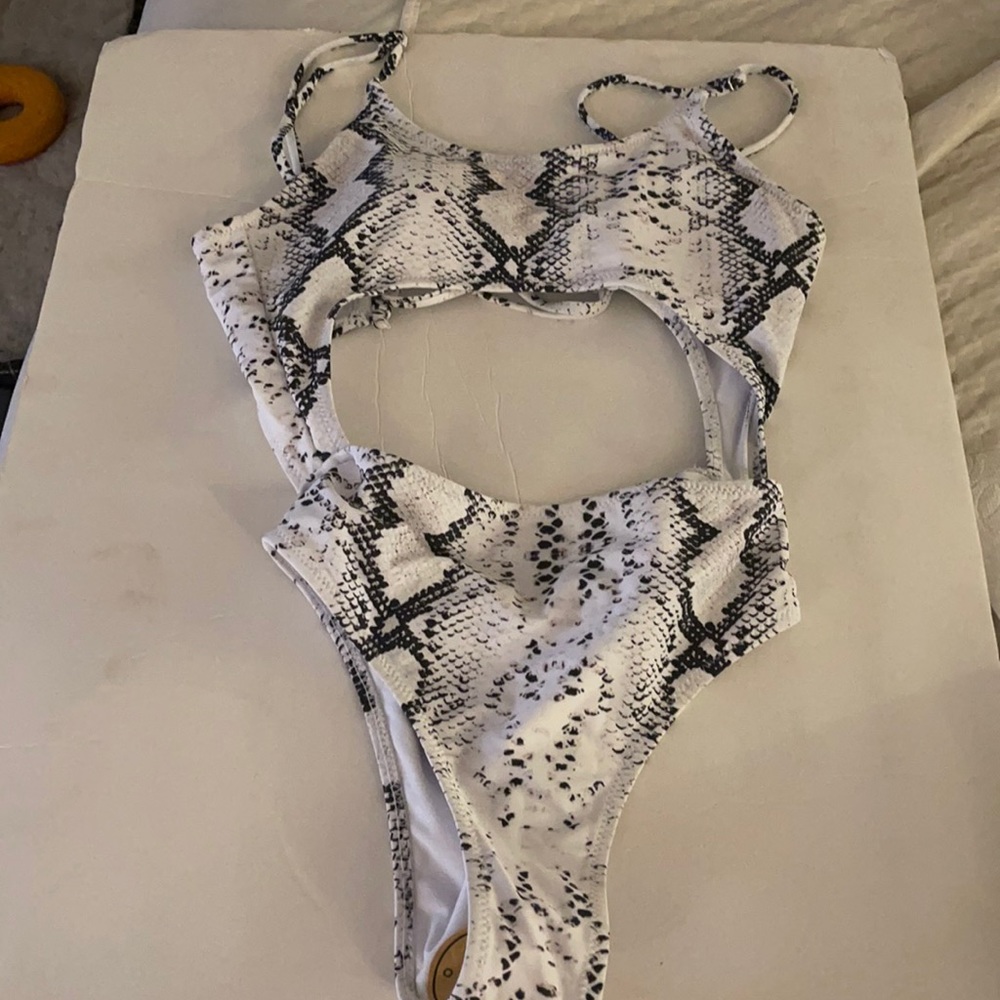 One piece snake print design bathing suit.